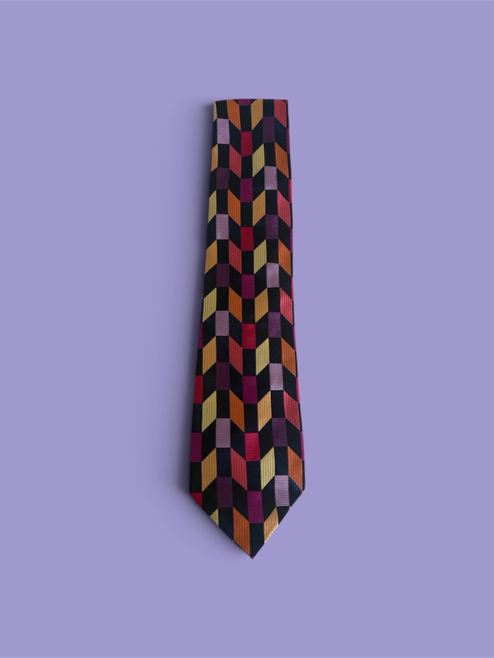 Duchamp Geometric Pattern Silk Tie in Black with Red, Purple and Gold Accents